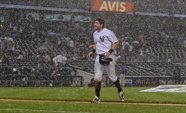 Dealing With a Yankees Rain Delay: Tips for Fans at the Stadium!