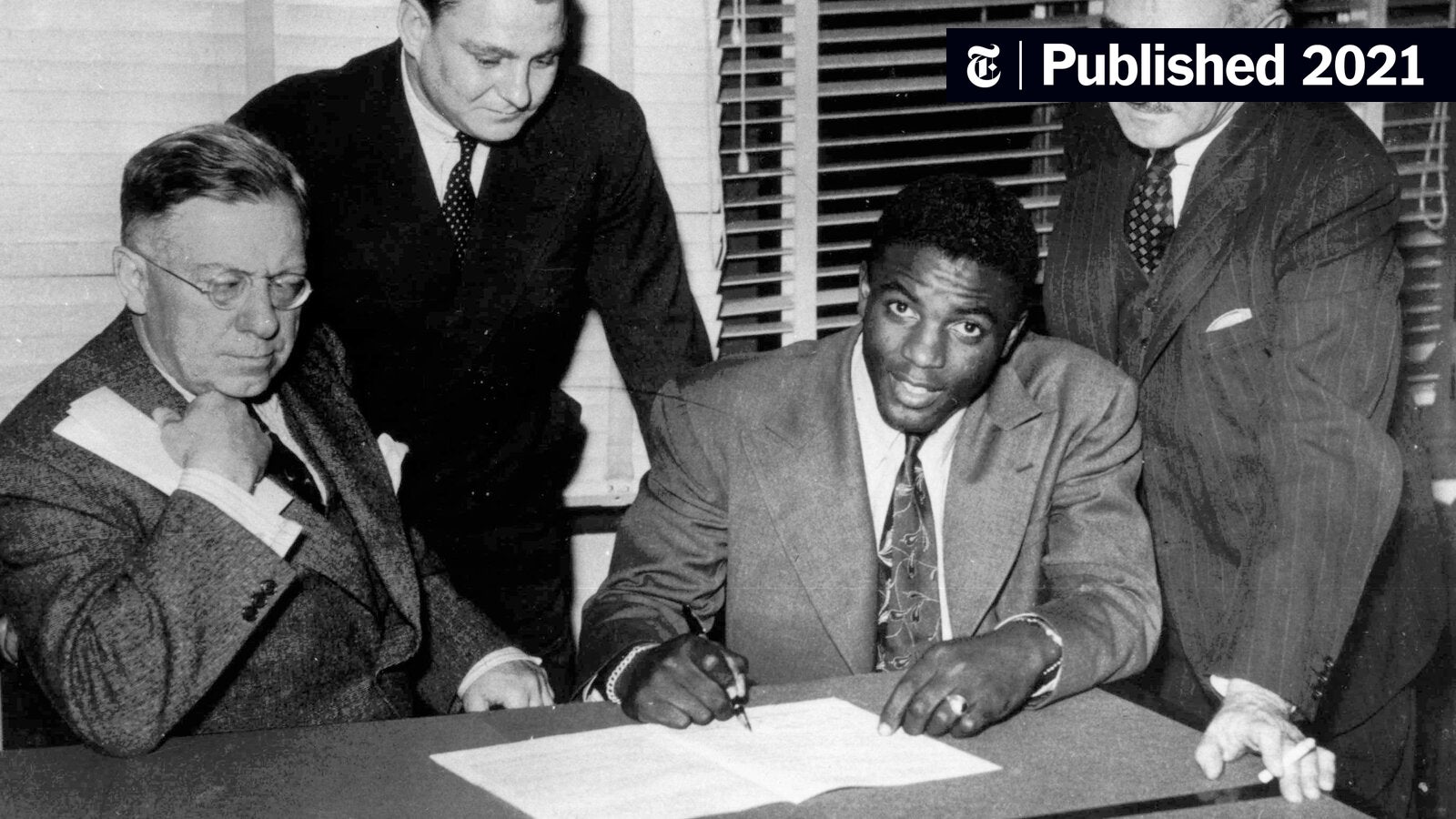 Where to Find the Photo of Jackie Robinson Signing Contract? This Legendary Image Changed the Game!